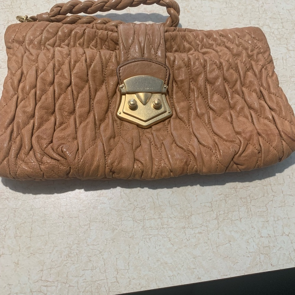 Elegant vintage Nina Ricci Tan Clutch Bag